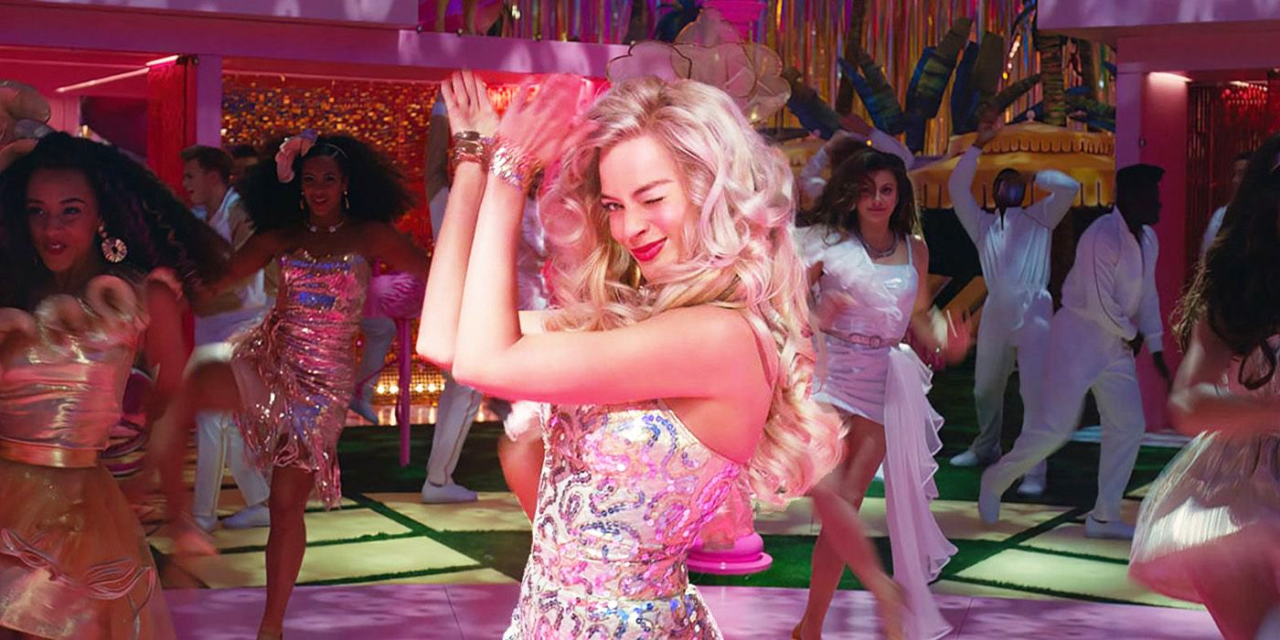 Margot Robbie como Barbie bailando en una fiesta en Barbie.