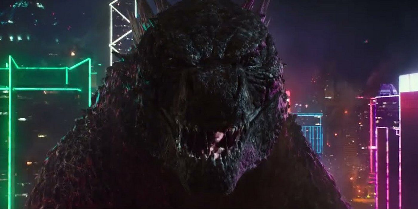 Godzilla stands in front of neon-lit buildings in Godzilla vs. Kong
