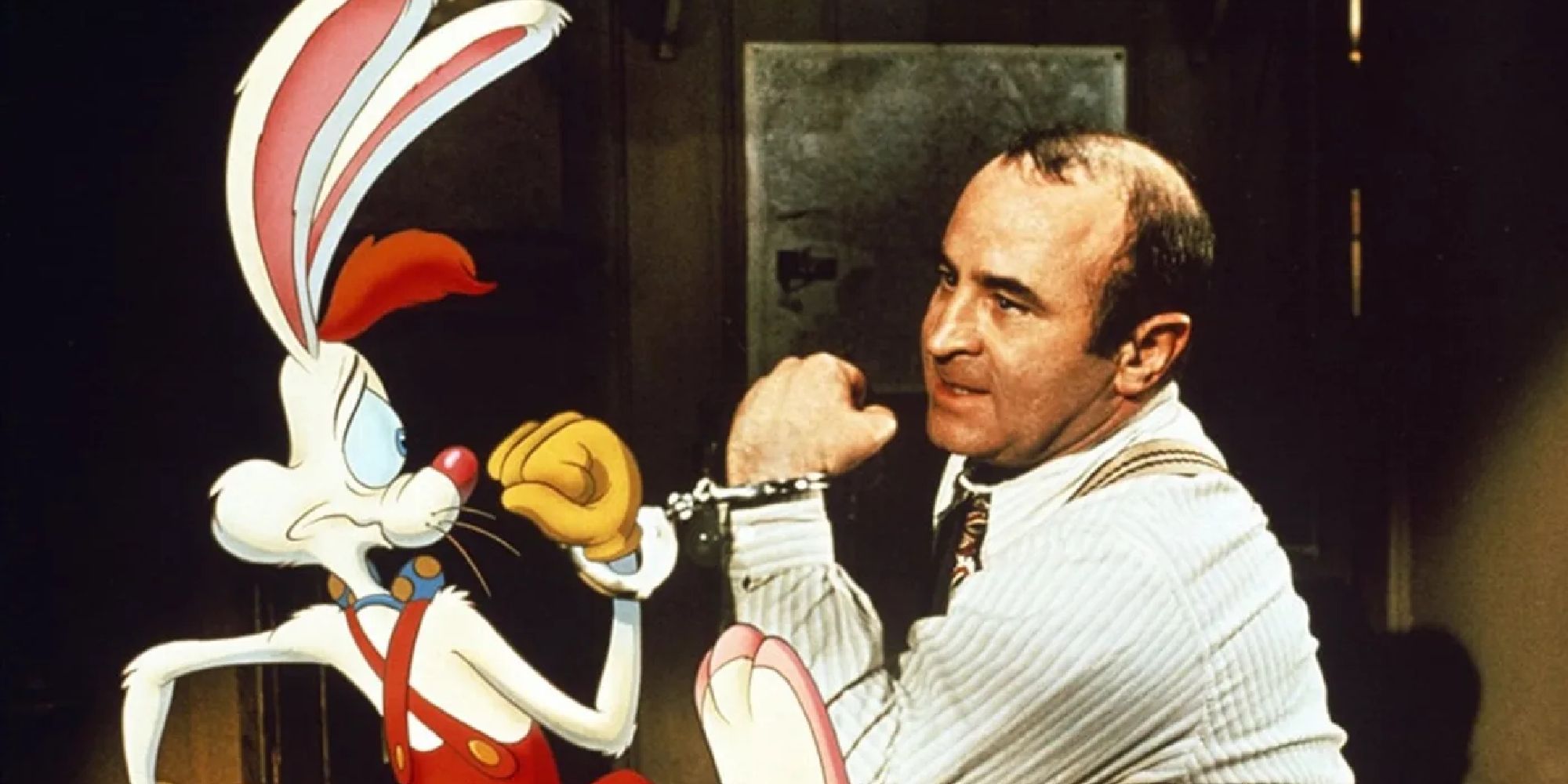 Roger Rabbit handcuffed to Bob Haskins as Eddie Valiant in Who Framed Roger Rabbit