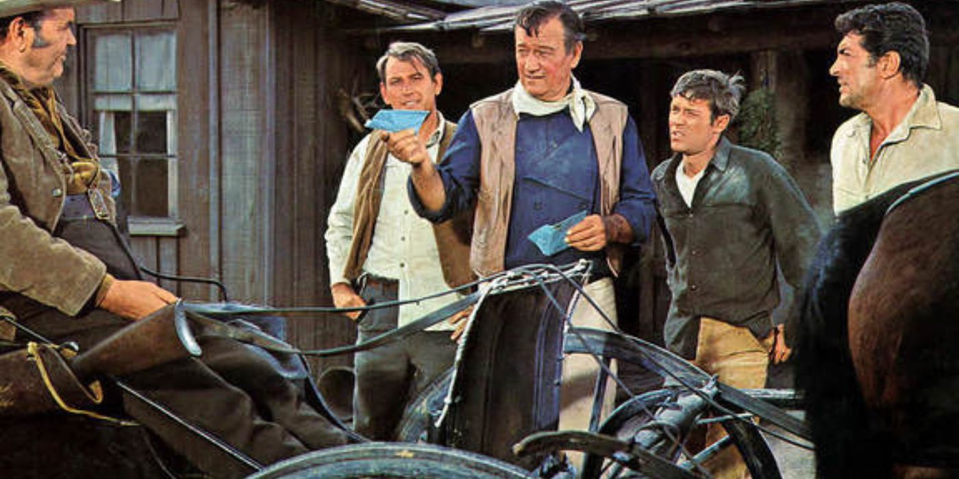 John Wayne y Dean Martin de pie con algunos hombres hablando con un hombre en un carruaje de caballos en Los hijos de Katie Elder