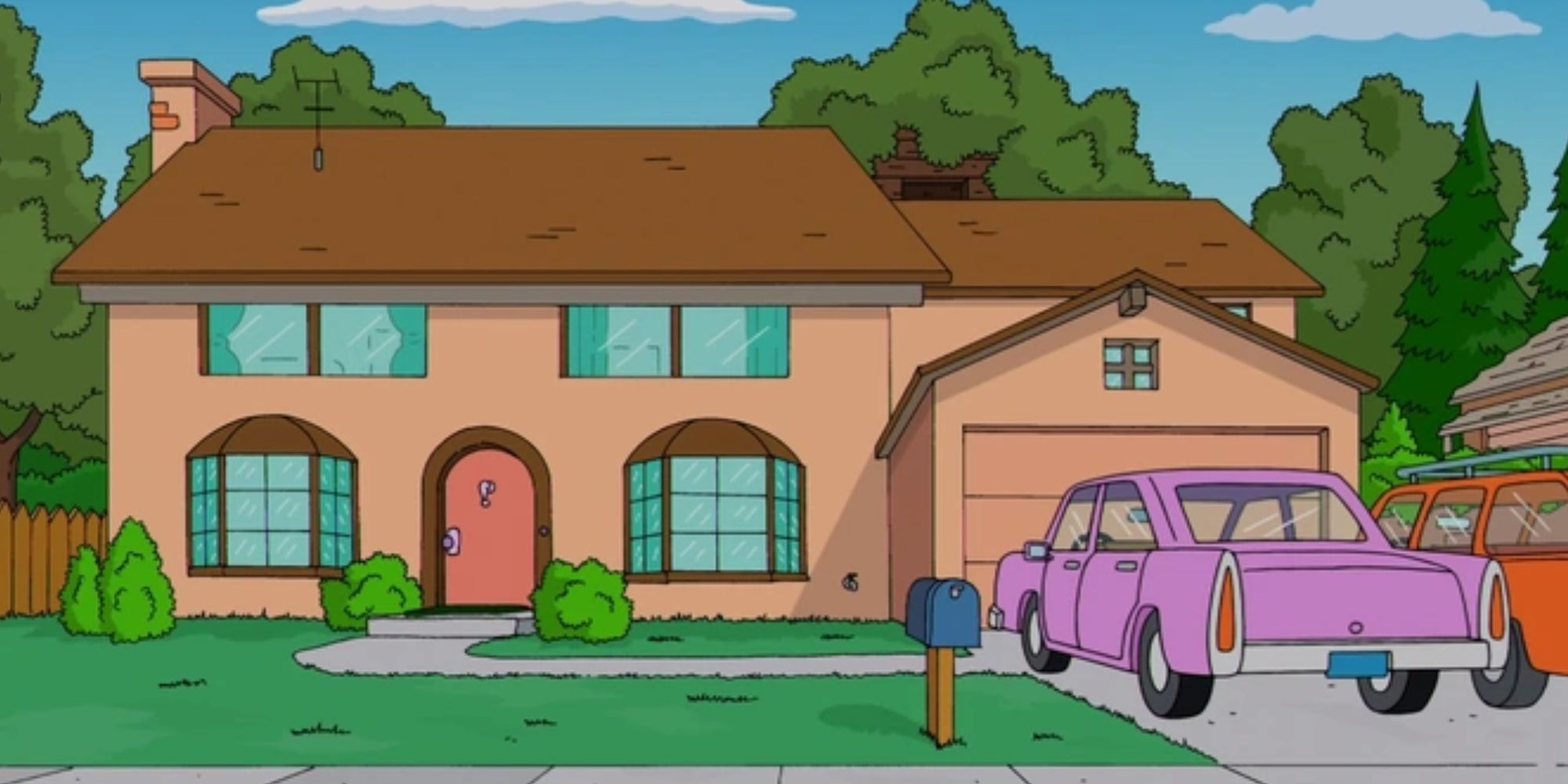 Una toma exterior de la casa de la familia Simpson con sus dos autos estacionados afuera.