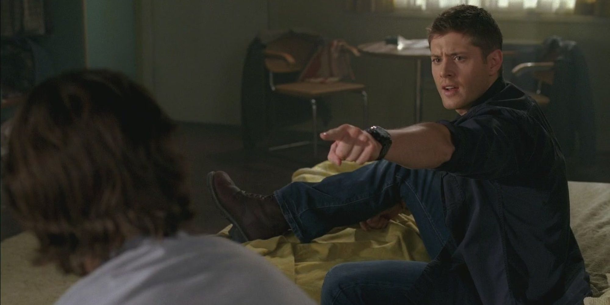 Jensen Ackles as Dean Winchester in Supernatural, pointing and singing