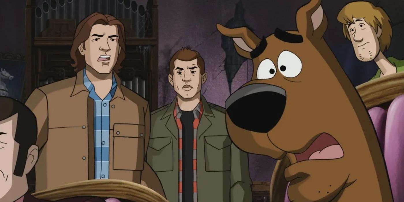 Animated Supernatural characters Sam and Dean stand with Scooby-Doo in a 'Supernatural' and 'Scooby-Doo! Where Are You?' crossover.