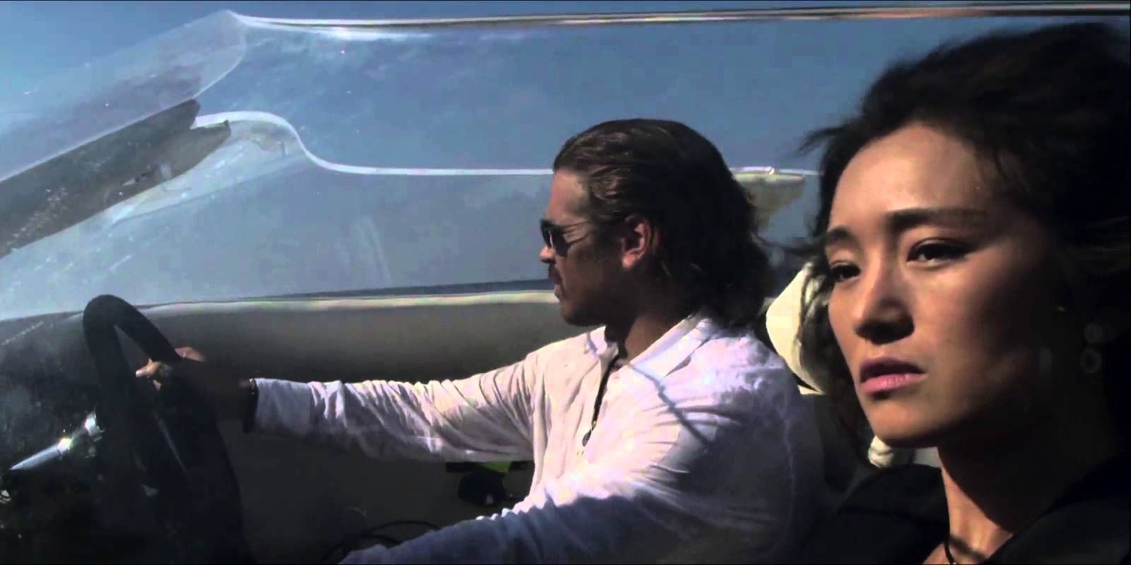 Gong Li y Colin Farrell viajando en lancha rápida en Miami Vice