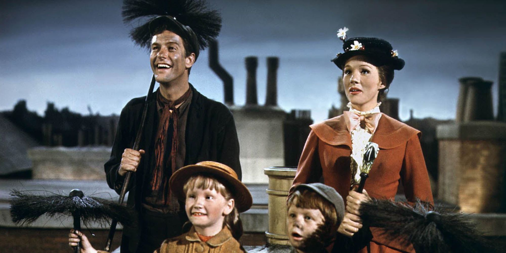 Mary Poppins (Julie Andrews), Bert (Dick Van Dyke), Jane (Karen Dotrice), and Michael (Matthew Garber) in 'Mary Poppins'